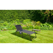 Technaxx Faltbare Solar-Sonnenliege TX-275 20W auf Rasen I © Technaxx – KI-bearbeitet Technaxx Faltbare Solar-Sonnenliege TX-275 20W auf Rasen I © Technaxx - KI-bearbeitet